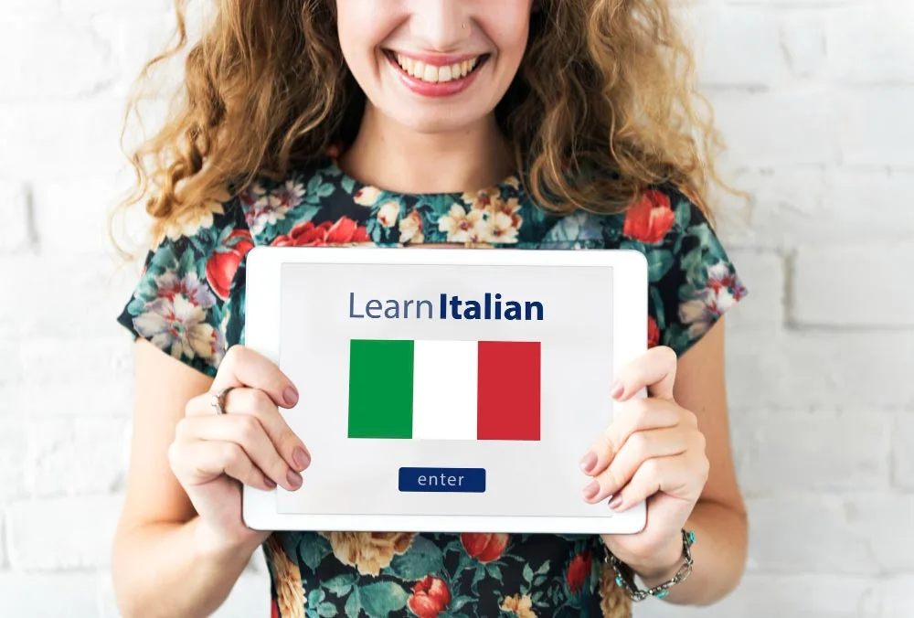 Woman holding tablet learn Italian flag